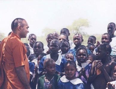 Bhante visits a remote village in Kenya where many children have lost their parents to AIDS.